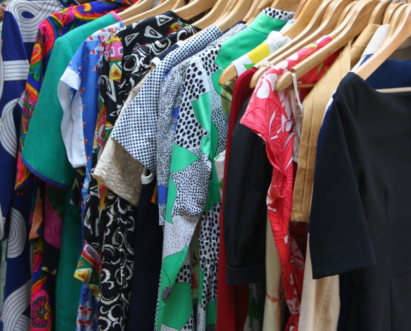 association-GORBIO-min_dresses_apparel_clothing_clothes_clothes_hangers_wooden_hangers_retail_shop_closet-1149845